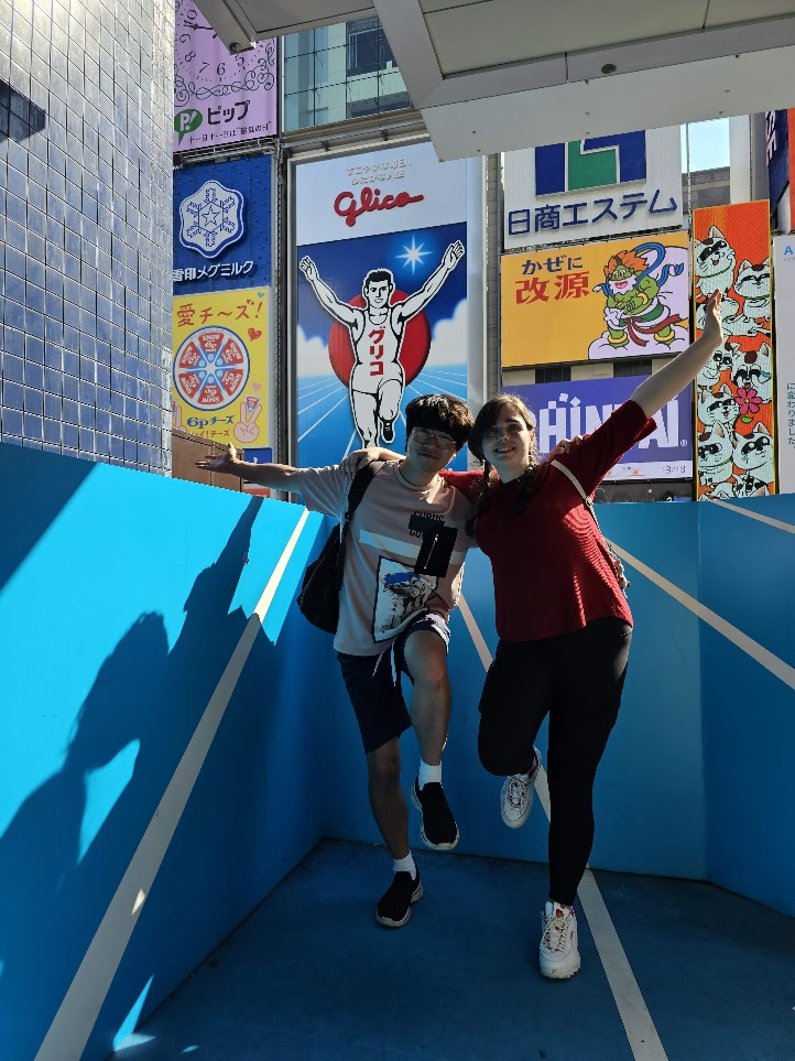 The couple posing in an exhibition space during their first trip to Japan