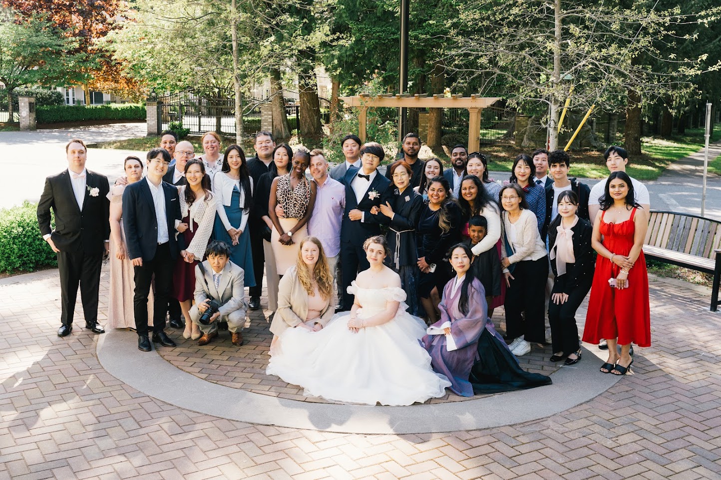 A group photo with family and friends at the Canadian wedding