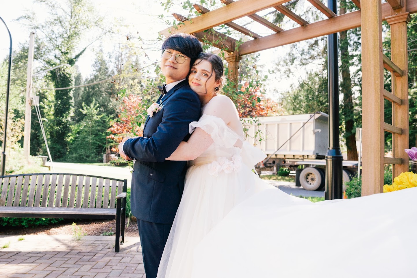 The couple embracing at their Canadian wedding